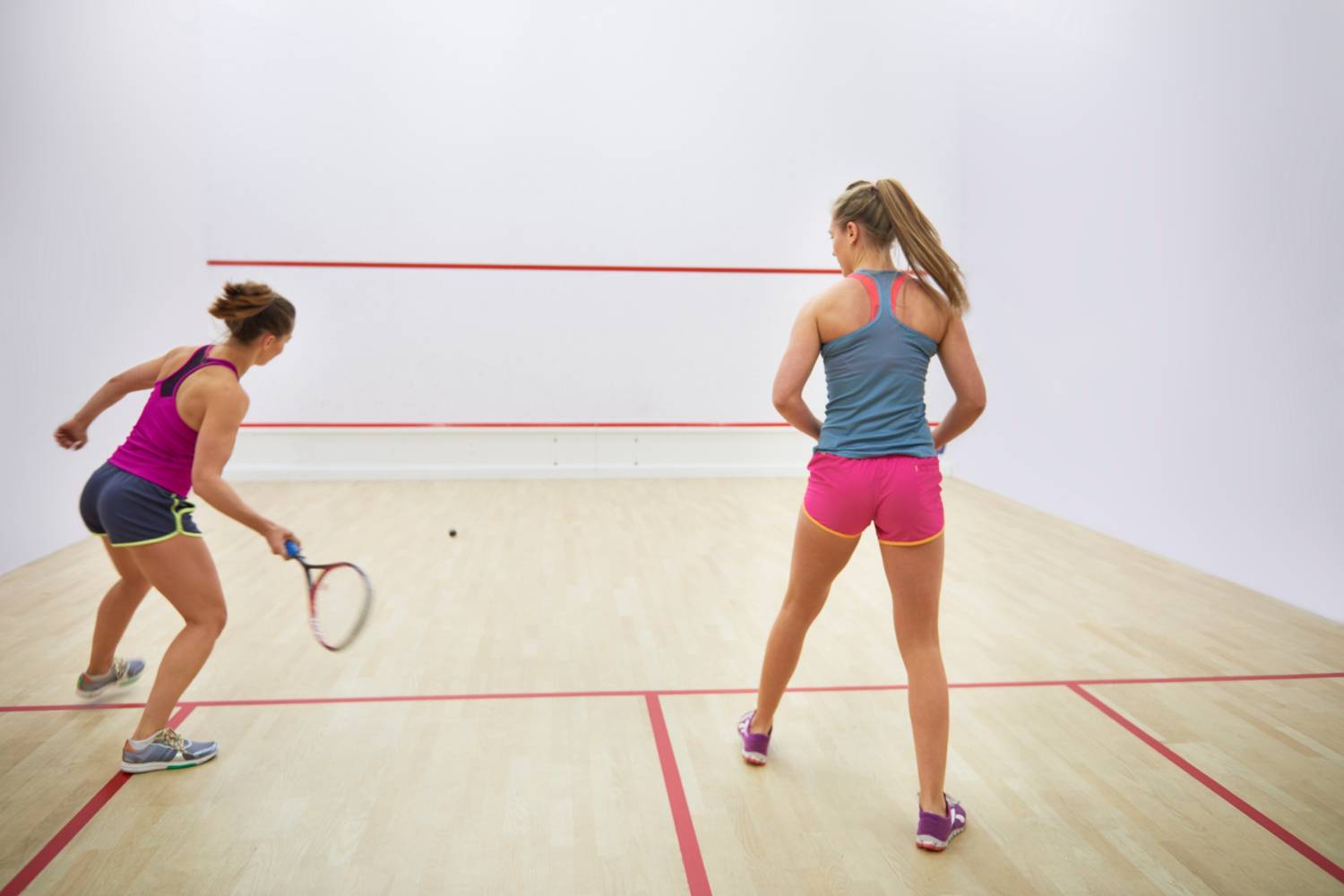 squash players on court